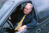 Feinstaub Russfilter Mann im Auto